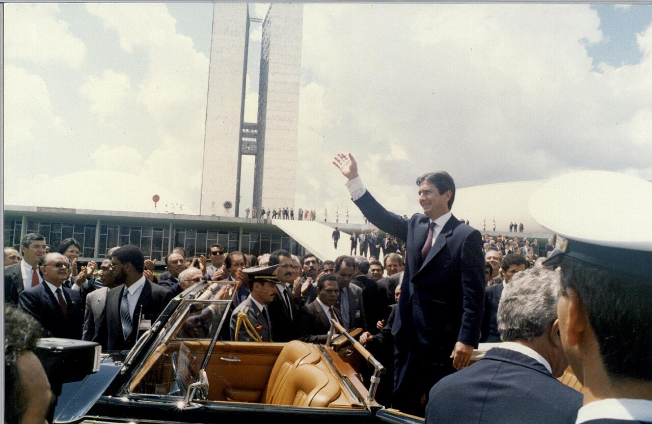 Fernando Collor waves from an open car in front of the National Congress in Brasília at his inauguration, 15 March 1990. Photo: Senado Federal, CC BY 2.0, via Wikimedia Commons