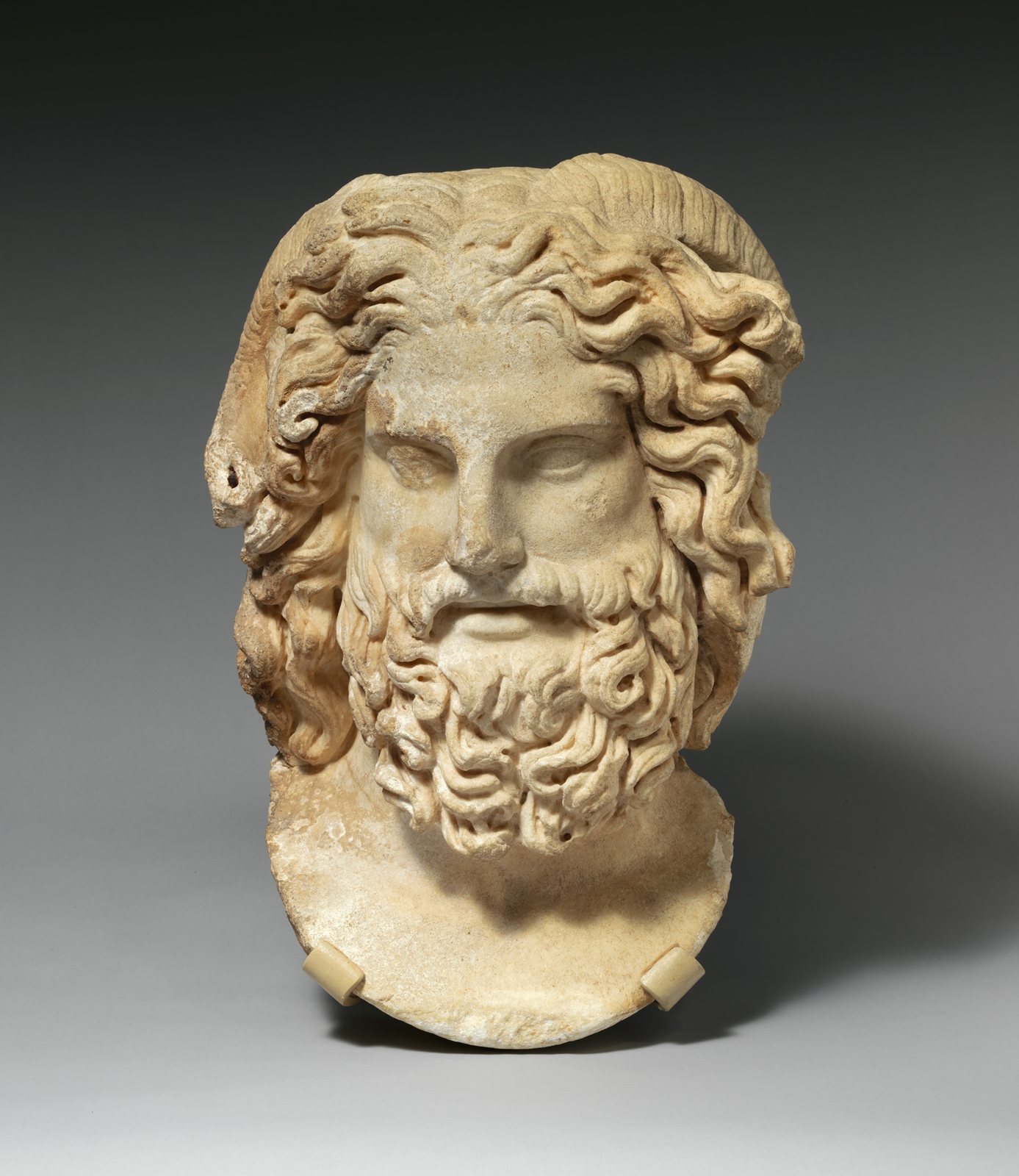 Marble head of Zeus Ammon with ram's horns, Roman, about 120 to 160 AD