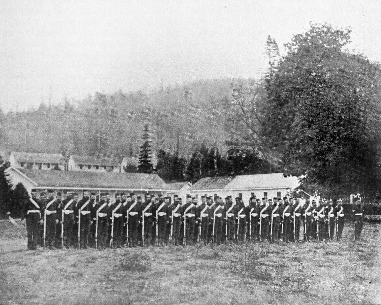 Photograph of Royal Marines lined up at English Camp on San Juan Island before leaving in 1872