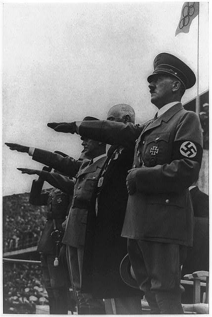 Photograph of Adolf Hitler saluting the Olympic flag at the Berlin Games in 1936, the year the Peace Prize went to Carl von Ossietzky
